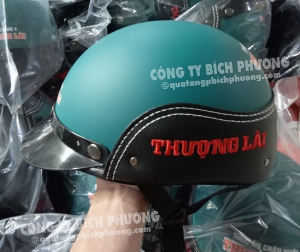 Nón bảo hiểm in logo nửa đầu ốp da Bích Phương